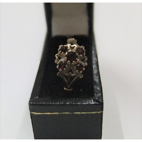 28 - 9ct yellow gold, 5 garnet ring

Approx 1.5 grams gross,           size N/O