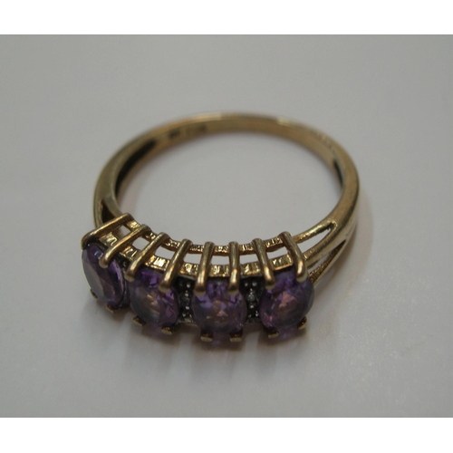 31 - 9ct yellow gold, amethyst & diamond ring,

Approx 2.3 grams gross,              size P