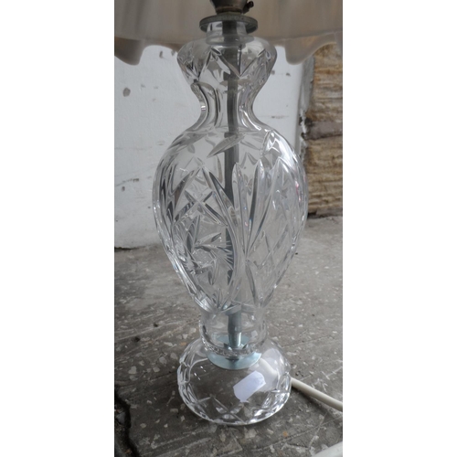 213 - Two cut-glass table lamps (2)