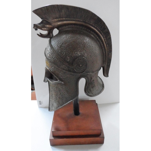 43 - Greek/Corinthian warrior helmet, cast bronze powder, polyester resin on plinth

Helmet - 47cm x 30 x... 