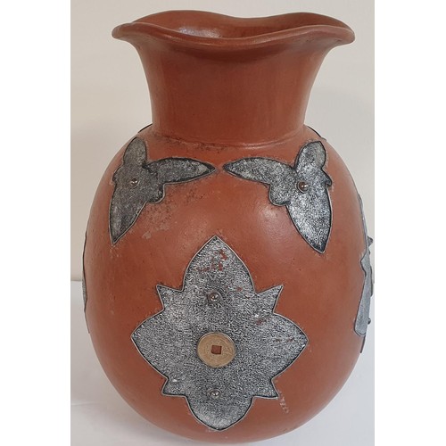 178 - Qinglong dynasty brown pottery vase with inlaid coins and a decorative metal surround believed to be... 