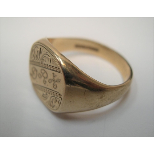 25 - 9ct yellow gold, gents signet ring, initialled D.R.M

Approx 9 grams,                size U