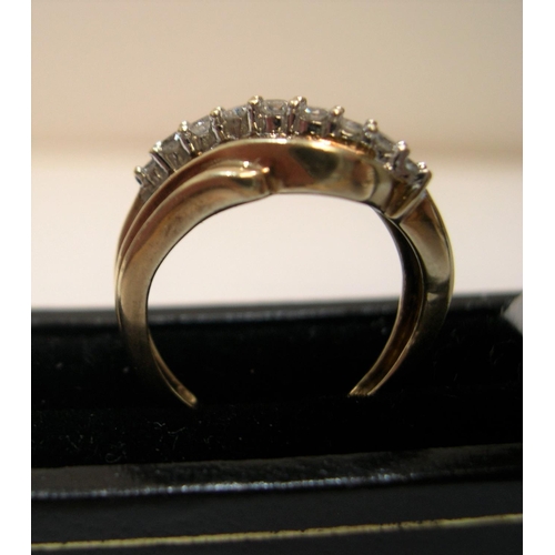 27 - 9ct yellow gold ring set with approx 38 diamonds, total weight approx 0.45ct.

The central row consi... 