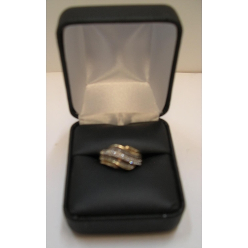 27 - 9ct yellow gold ring set with approx 38 diamonds, total weight approx 0.45ct.

The central row consi... 