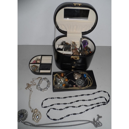 37 - Fine quality ladies jewellery travel case stuffed full of ladies costume jewellery