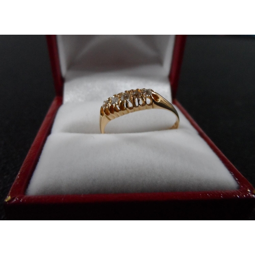 42 - 18ct yellow gold 5 diamond ring in presentation box,

approx 2.6 grams gross           size Q