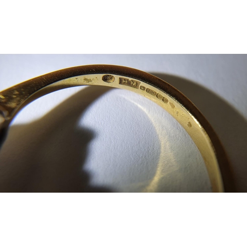 49 - 18ct yellow gold ring set with a central Sapphire (approx 2.2cts) flanked to either side by a round ... 