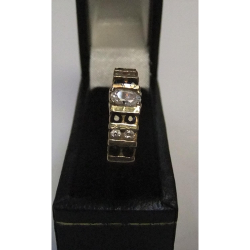 51 - 14ct yellow gold ring set with alternating sapphire & diamonds

approx 3.1 grams gross,           si... 