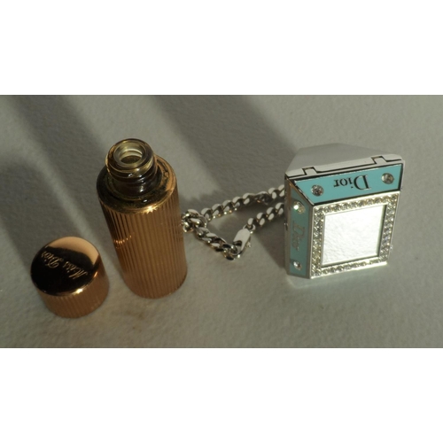 54 - Christian Dior miniature re-fillable perfume bottle  together with a Christian Dior compact ring (2)