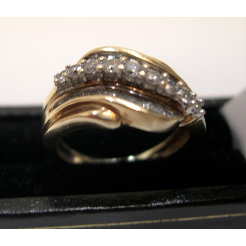 57 - 9ct yellow gold ring set with approx 38 diamonds, total weight approx 0.45ct.

The central row consi... 
