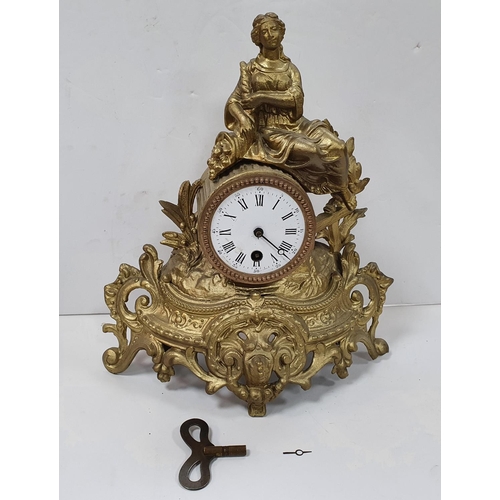 84 - French gilt metal figural mantle clock with key & pendulum
