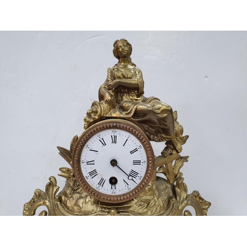 84 - French gilt metal figural mantle clock with key & pendulum