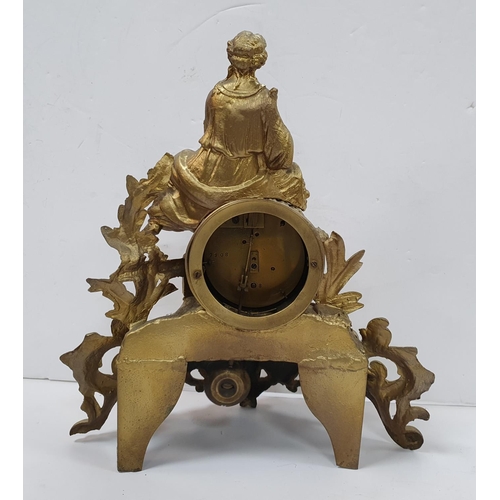 84 - French gilt metal figural mantle clock with key & pendulum