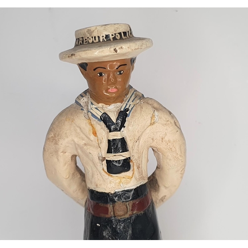 95 - Early 20thC Barbados ceramic figure of a Barbados harbour police figure (a/f),

22 cm tall