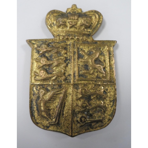 116 - Early/mid 20thC gilt metal cast badge depicting a crown above the Royal Standard,

6 cm tall