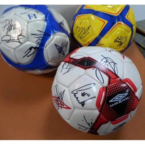 136 - Three signed Blackburn Rovers footballs and a Bury F C example (4)