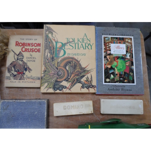 178 - Collection of toys and books to include a handmade doll, vintage domino sets and a miniature cased c... 