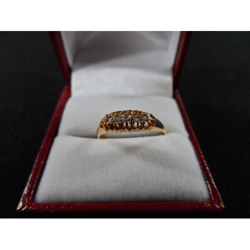 39 - 18ct yellow gold 5 diamond ring in presentation box,

approx 2.6 grams gross           size Q