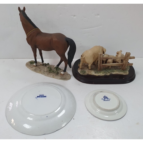 281 - Two Delft plates and 2 Leonardo farm figurines (4)