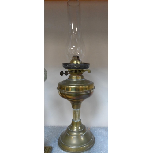 379 - Fine quality brass columned stem oil lamp together with 2 others, 1 converted (3)