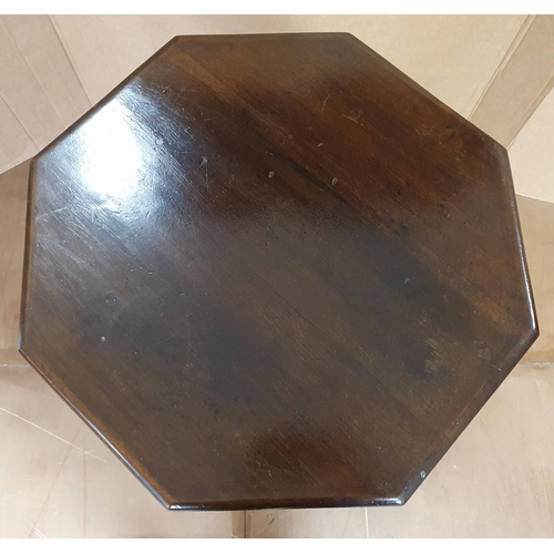 554 - Hexagonal tri-footed, tip table