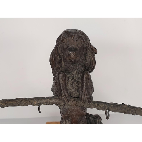 98 - Stunning unmarked, early 20thC bronze of a small dog on its hind legs with a stick in its mouth on a... 