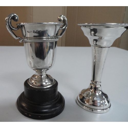 2 - Silver trophy together with a silver bud vase (2),

132 grams gross