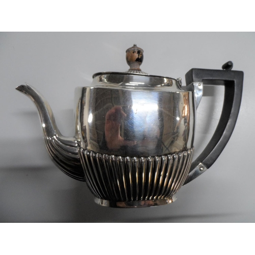 22 - Victorian silver half fluted design teapot, Birmingham 1897,

370 grams gross