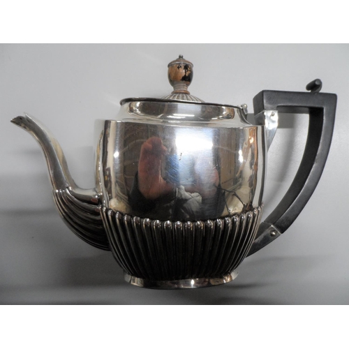 22 - Victorian silver half fluted design teapot, Birmingham 1897,

370 grams gross