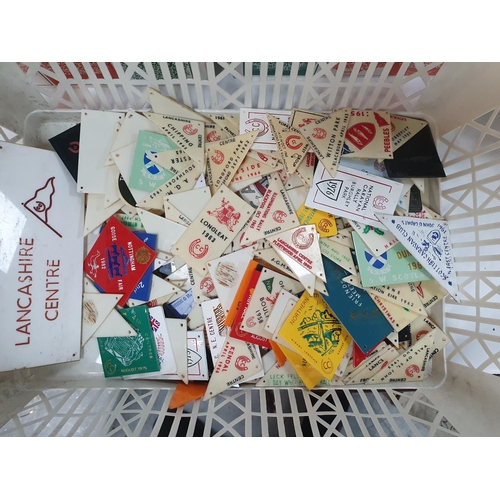 122 - Large quantity of vintage caravan & rally badges, a large quantity of postcards and a large quantity... 