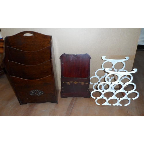 440 - Wooden Edwardian magazine rack & letter rack together with a mid 20thC cast iron wine rack (3)