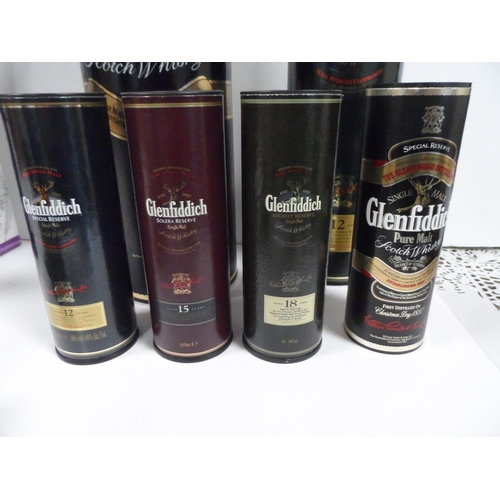 386 - 8 Glenfiddich cased bottles from 3 miniatures (12,15 & 18 year old) to full 70cl bottle (8)