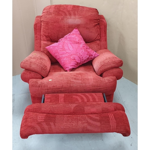 500 - Vintage red reclining swivel armchair with cushions and throw