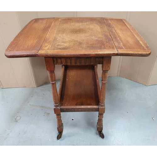 502 - Mid 20thC 2 seater settee (a/f) together with an oak drop leaf table/trolley (2)