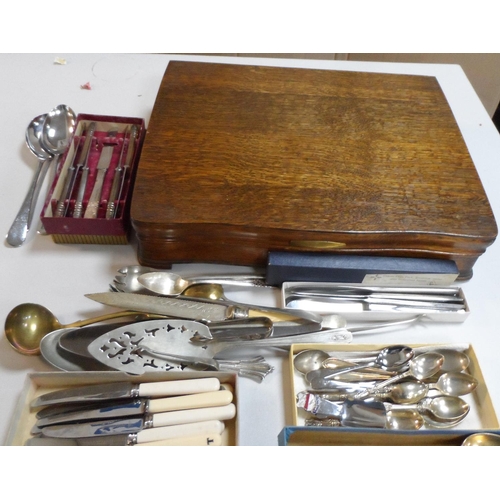 451 - Mid 20thC oak cased cutlery set together with other loose mid 20thC cutlery (Qty)