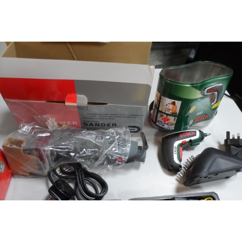 404 - Collection of power tools including a Bosch drill in its original metal tin (Qty)