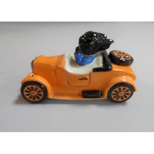 324 - A Carlton Ware China model Golly in a Car, Marked Trial