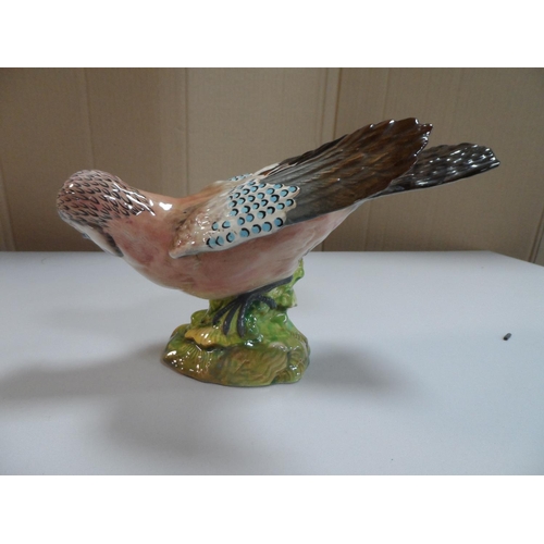 325 - Beswick pottery figure modeled as a jay, No 1219, printed and impressed marks