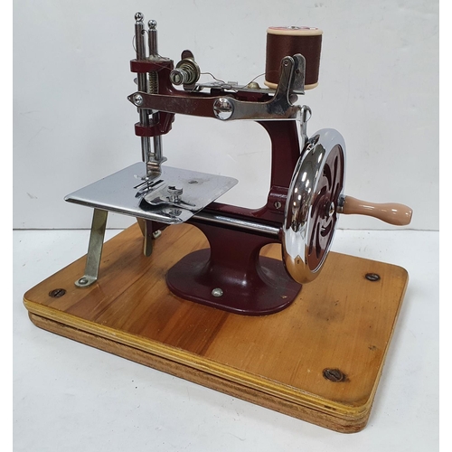 474 - Cased Essex miniature sewing machine