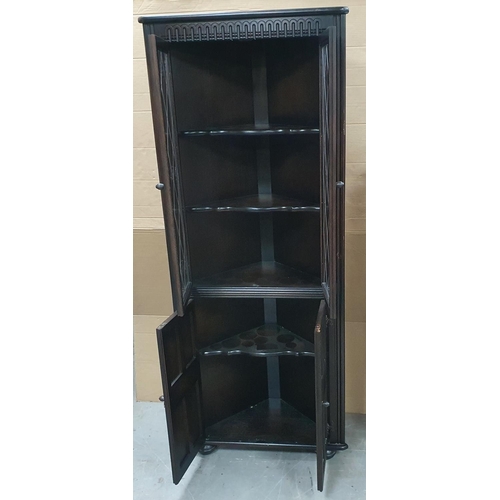 551 - Glazed dark wood corner cabinet,

168 cm tall