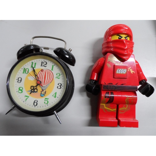 174 - Two Nintendo lites, vintage alarm clock and lego man (4)