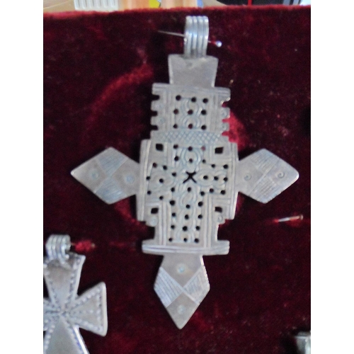 148 - 11 early/mid 20thc Ethiopian Coptic Christian Crosses, all possibly silver (all unmarked)