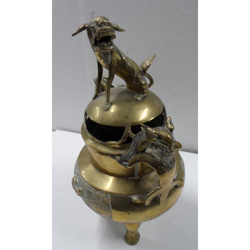 115 - Vintage, well cast Chinese brass charger with dragon handles toped with a seated foo dog