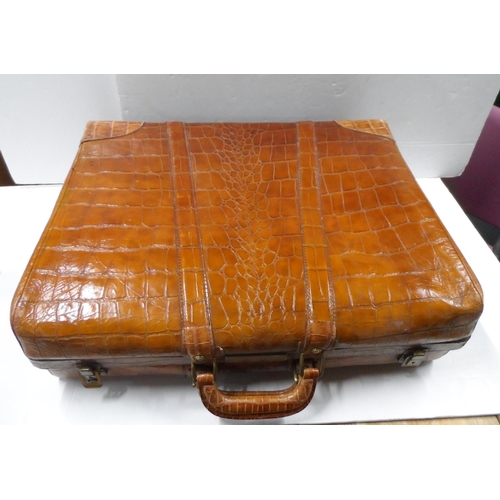 485 - Stunning mid 20thC Crocodile skin, two handled suitcase,

No makers labels