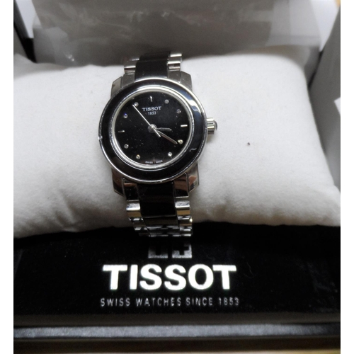 100 - Boxed Tissot unisex watch complete with links and paperwork