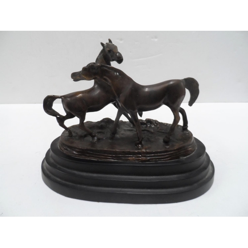 117 - Cast bronze of two wild horses after P J Mene, bears signature & on raised black metal base,

24 cm ... 