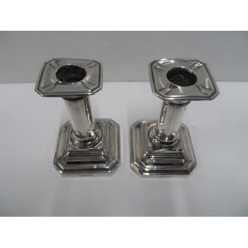 4 - Pair of Edwardian silver, squat Art Nouveau style candlesticks (2),

11 cm tall