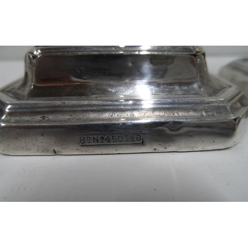 4 - Pair of Edwardian silver, squat Art Nouveau style candlesticks (2),

11 cm tall