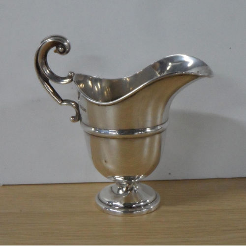 12 - Sheffield 1919 silver cream jug, marks partially rubbed,

51 grams