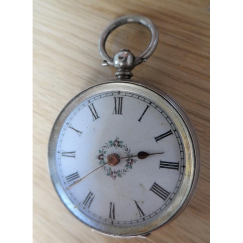 92 - Ladies unmarked, decorated enamel fronted antique European 800 silver pocket watch